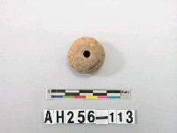 藏品(紅色夾砂雙錐陶紡輪)的圖片